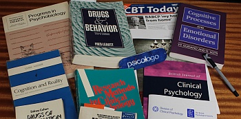 Array of psychology books and journals