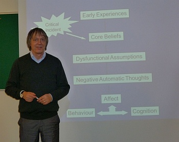 Derek teaching basics of CBT
